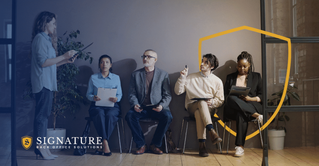 Professional woman presenting to diverse business team in modern office, demonstrating effective storytelling for staffing firms and client engagement strategies.