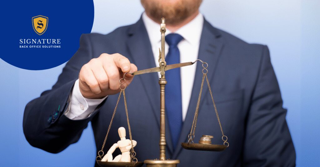 Business executive holding scales of justice representing temp worker compliance and EOR solutions.