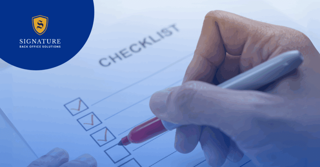 Hand filling out checklist form representing essential staffing compliance checklist process.