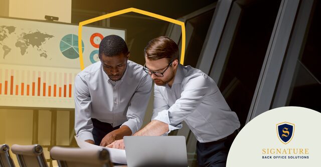 Two staffing professionals reviewing operational data and analytics for scaling staffing operations effectively.