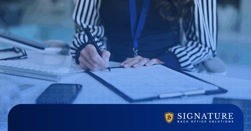 Professional signing contract documents representing adding contract placements.
