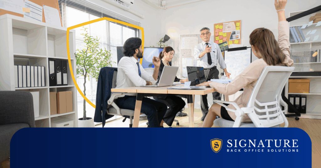 Staffing team collaborating on streamlined onboarding temp contractor's implementation.