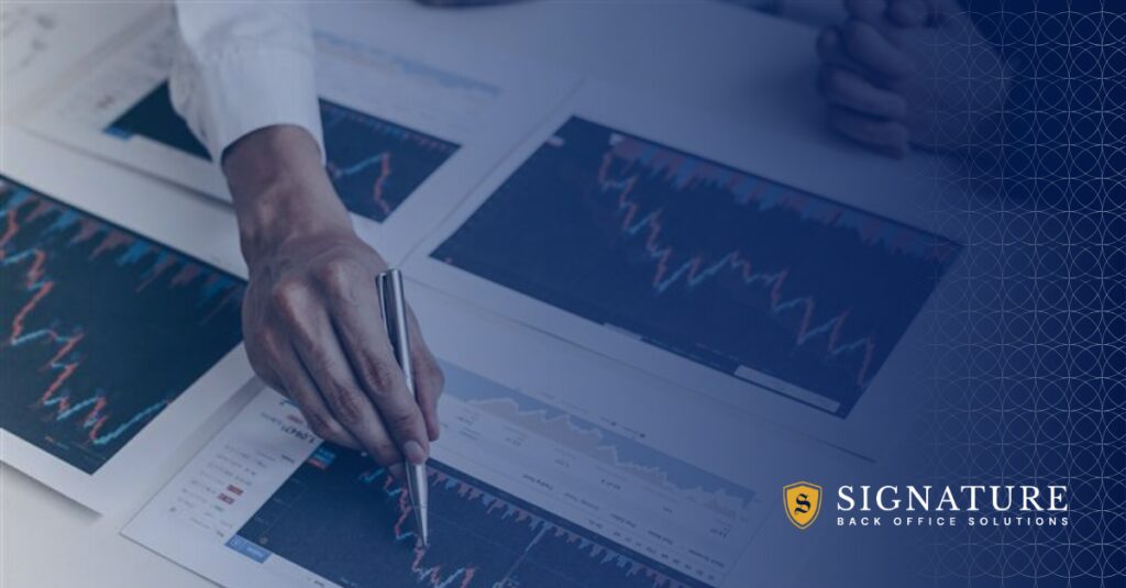 Professional reviewing data to manage contract-to-hire transitions and reduce risk