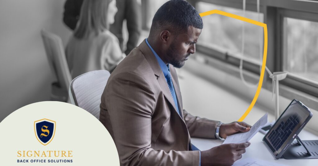 Staffing professional reviewing documents to build a high-value contractor talent pipeline